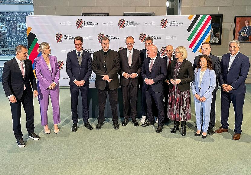 Merz unterzeichnet Vereinbarung für Olympiabewerbung